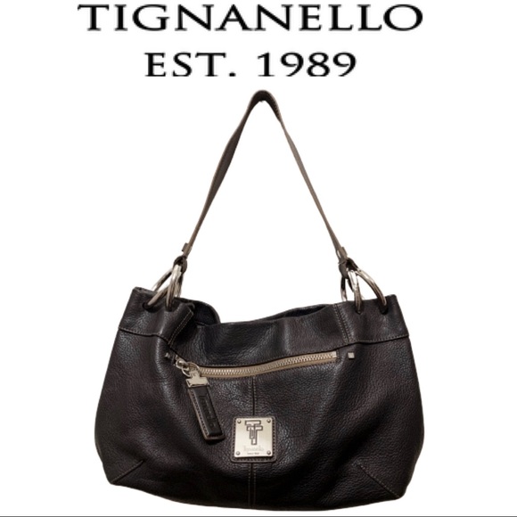 Tignanello Handbags - Tignanello Beautiful black leather purse EUC